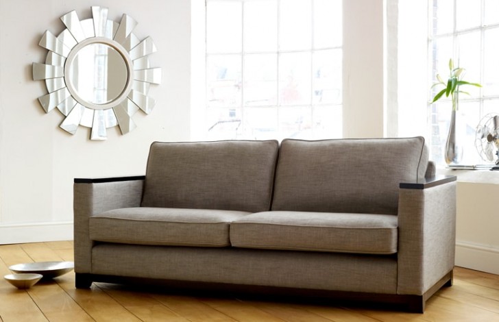 Sofa with outlet wood trim