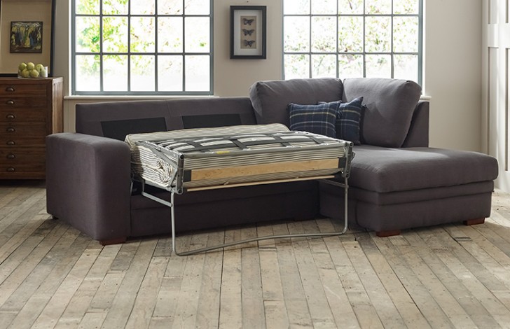 Leather sectional couch with 2025 pull out bed