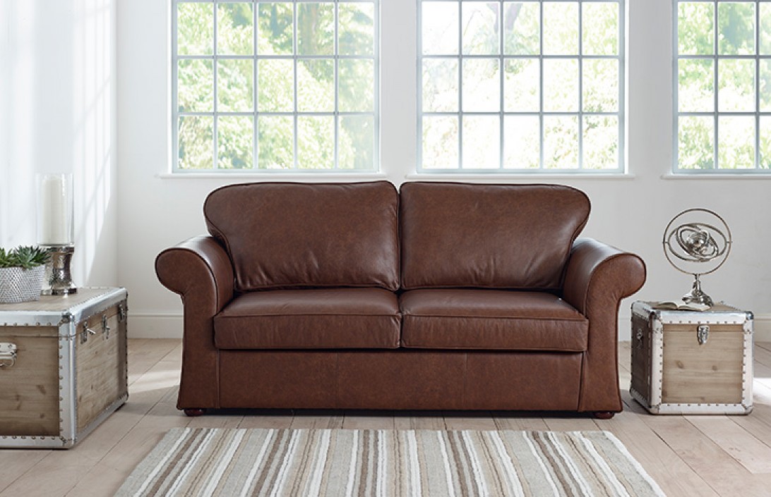 Sworth Curved Leather Sofa, Distressed Leather Sofa Ashley Furniture