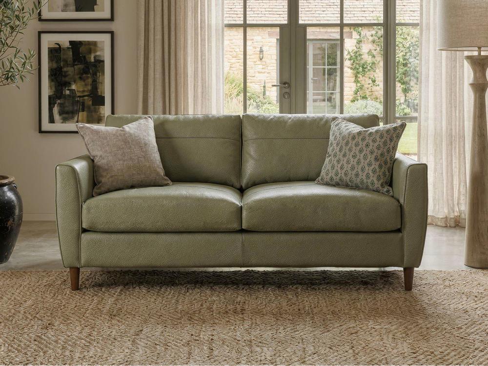 Harris Chesterfield chaise sofa in green velvet in a styled living room